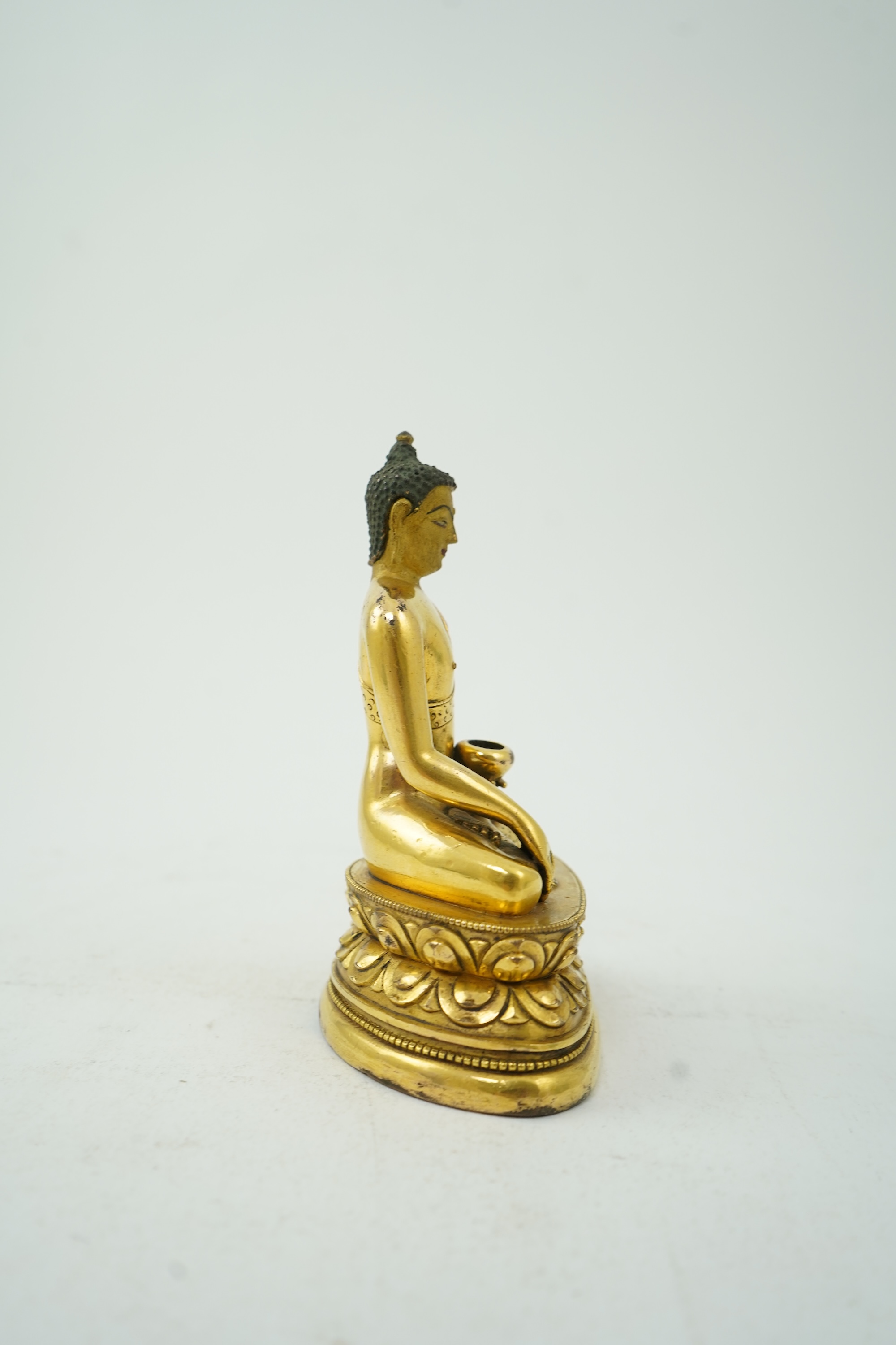 A Mongolian gilt-bronze figure of Buddha Shakyamuni, possibly 18th century